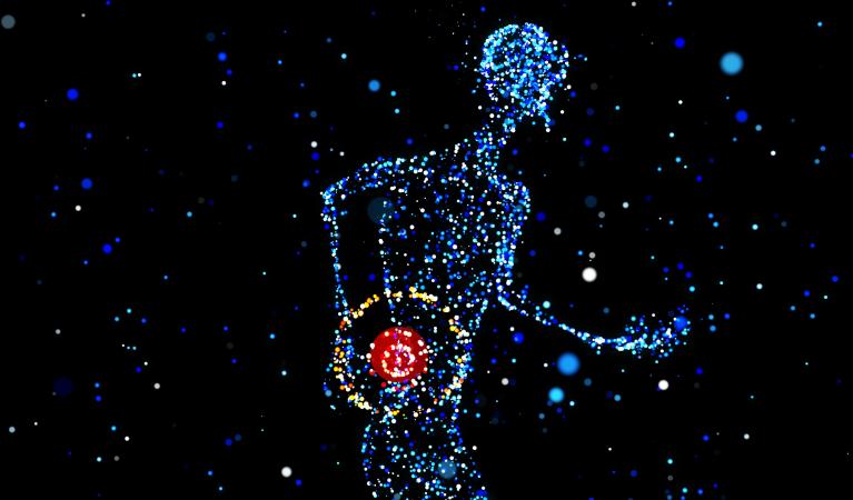 Abstrakti ympyröistä muodostetty ihmishahmo, jonka alaselän kohdalla on punainen hohtava pallo.