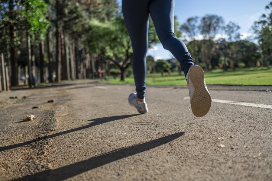 Legs of a woman jogging.